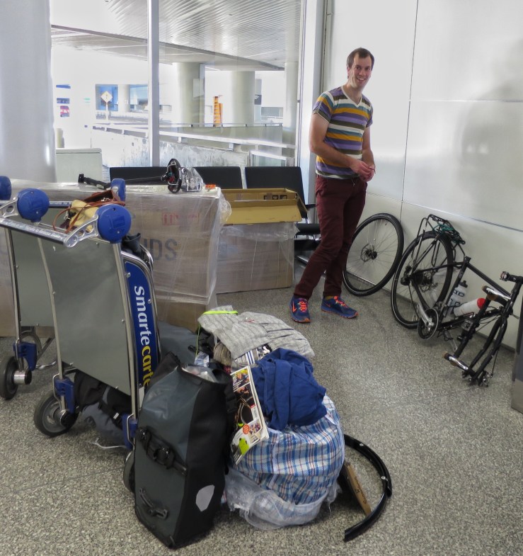 Pleased to find nothing was broken as we re-assemble the bikes in the airport.